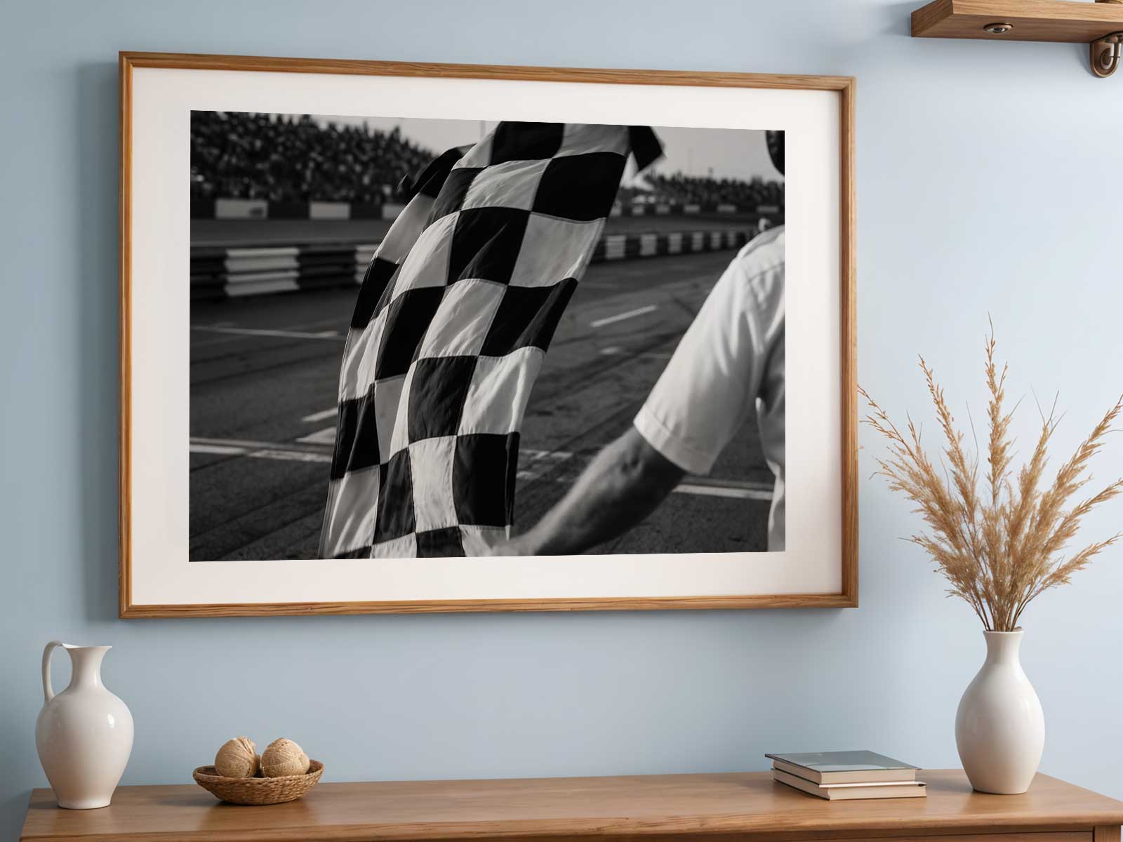 Close-up of a chequered flag waving as a Formula 1 car crosses the finish line at Spielberg