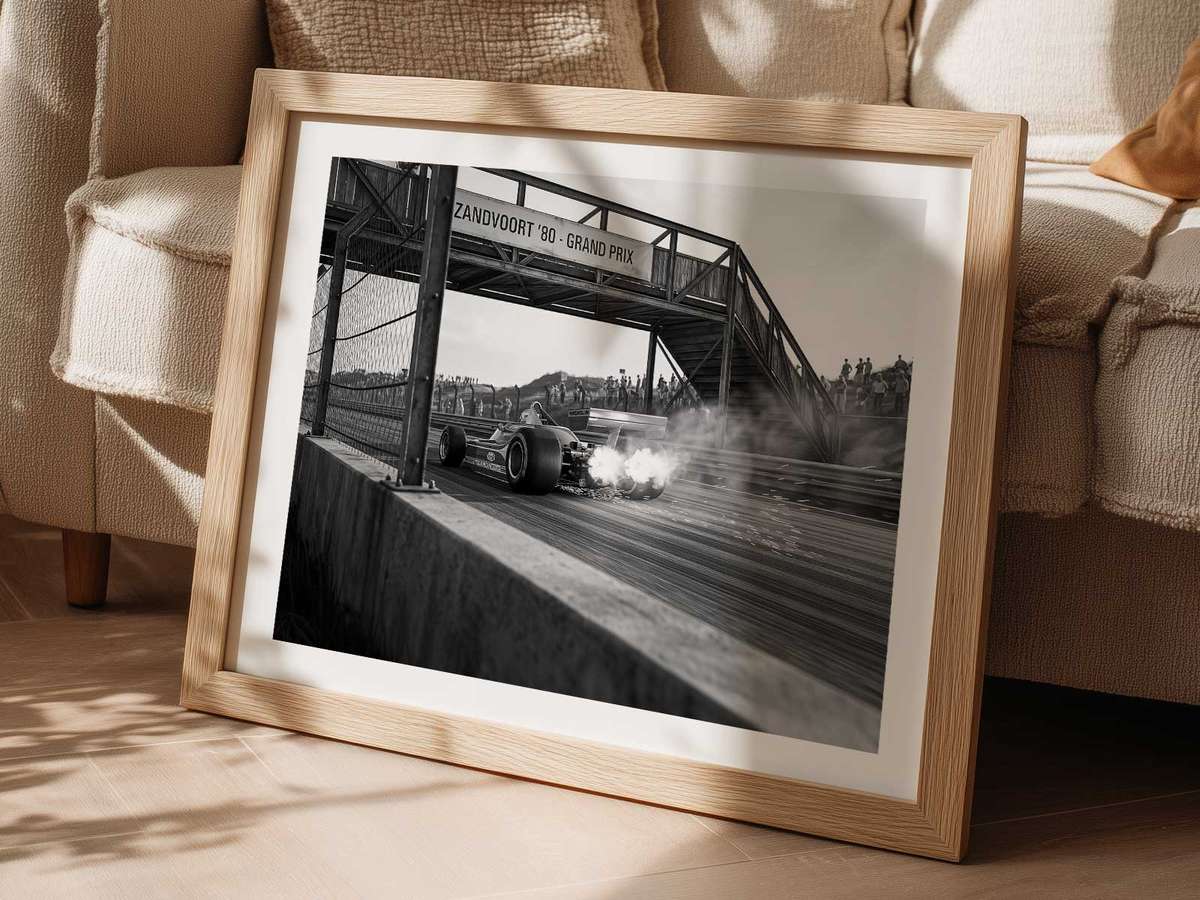 Composition that uses negative space around a Ferrari F1 car to emphasize its silhouette and the feeling of movement