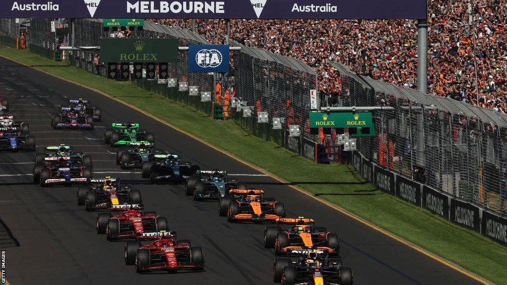 Aerial view of Albert Park circuit showing the lake, tree-lined straights and tight complex of corners