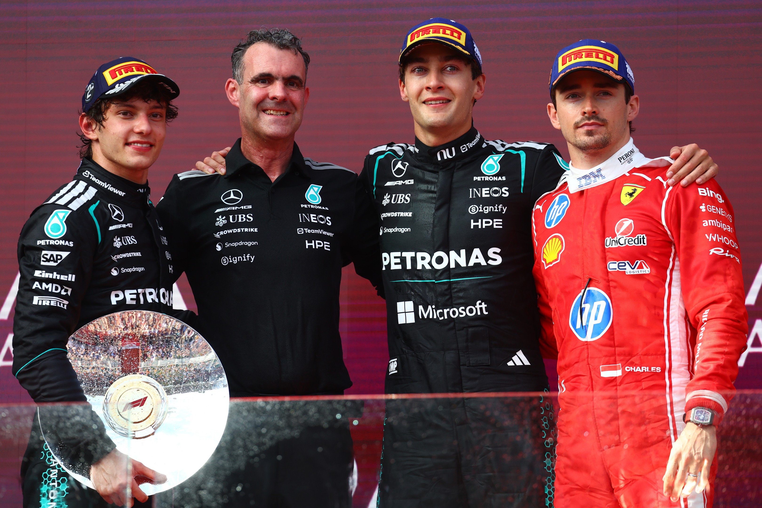 George Russell celebrating on the pit lane with team after winning the 2026 Australian Grand Prix at Albert Park