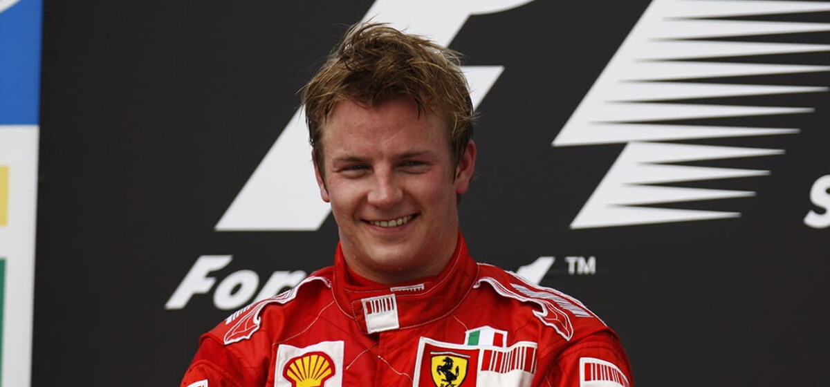 Kimi Räikkönen in the cockpit concentrating before a race start, hands on the steering wheel