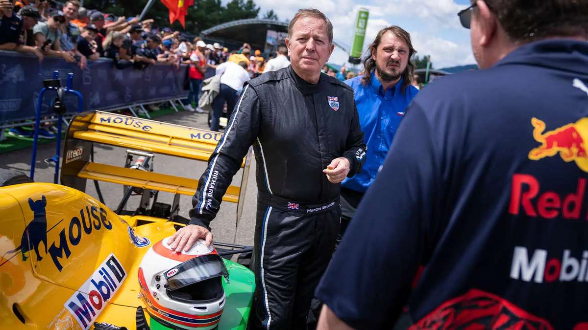 Portrait of Martin Brundle during recovery after injury, seated with a bandaged head and reflective expression