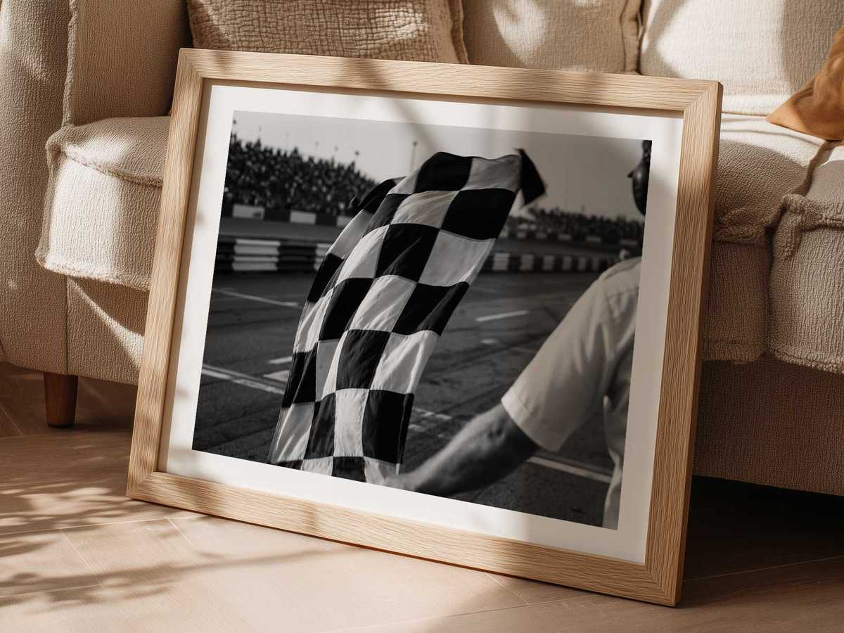Silhouetted palms against a sun-drenched backdrop with distressed borders and subtle racing iconography in vintage tones