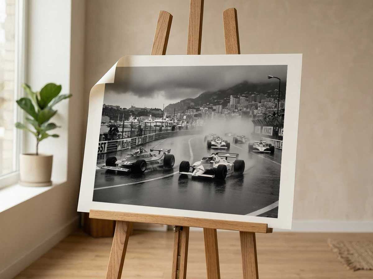 Poster from low perspective showing a peloton of F1 cars receding into rainy mist, conveying depth and organized chaos