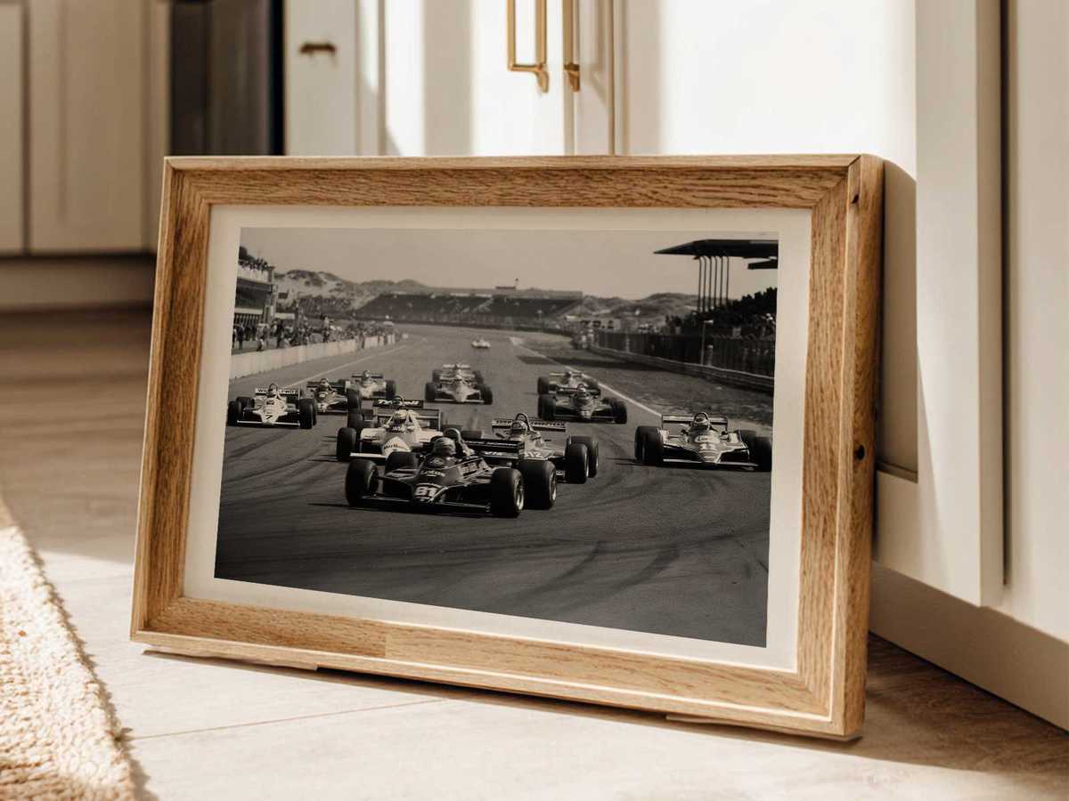 Graphic silhouettes of F1 cars layered to emphasize team identity and motion, minimalist color palette for a premium…