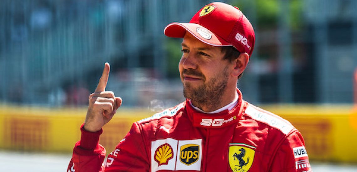Seb Vettel braking precisely into a sharp corner with front wheels turned and braking lights visible