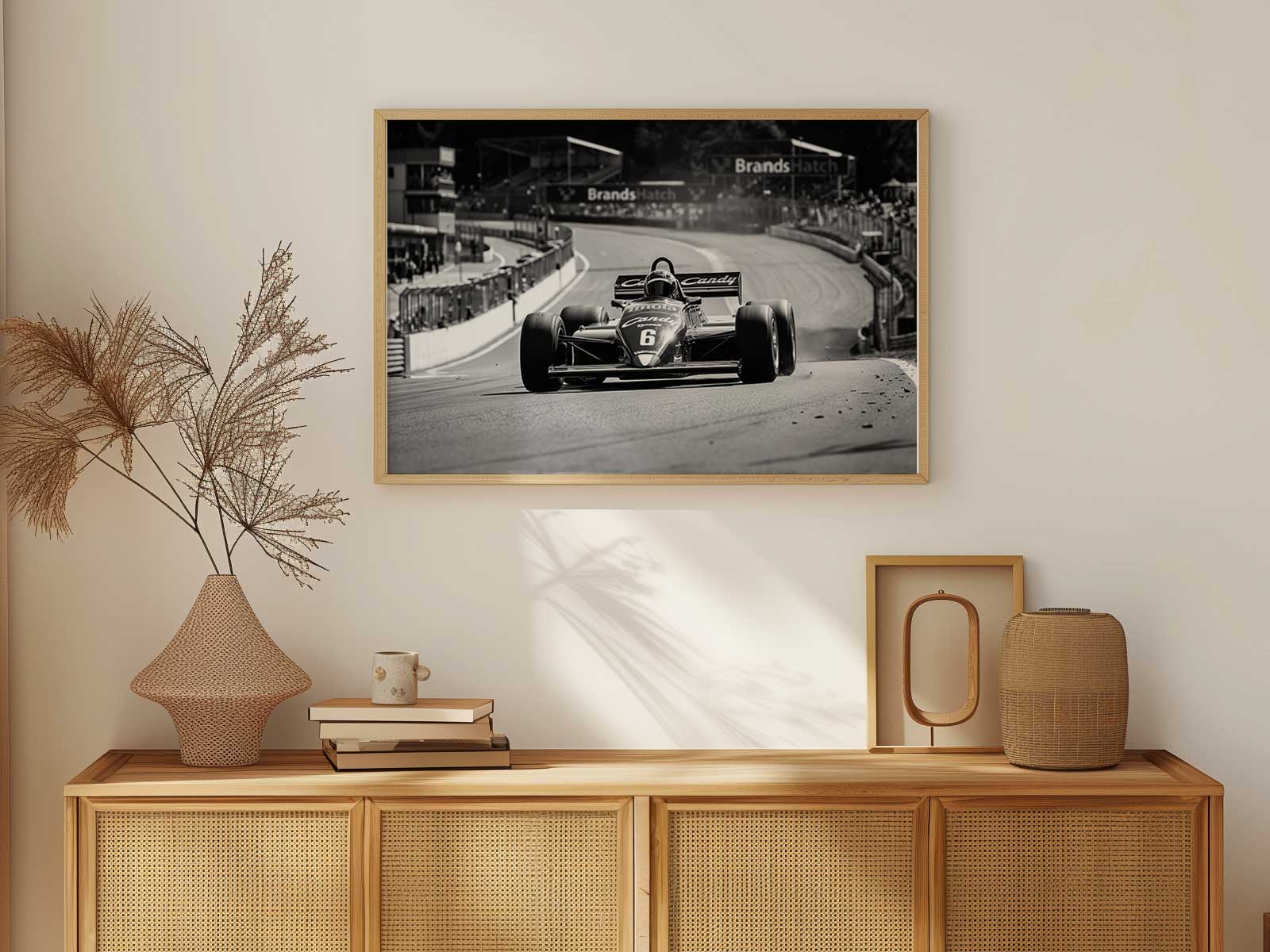 Detail of Tyrrell racing badges and livery elements framed as graphic decor