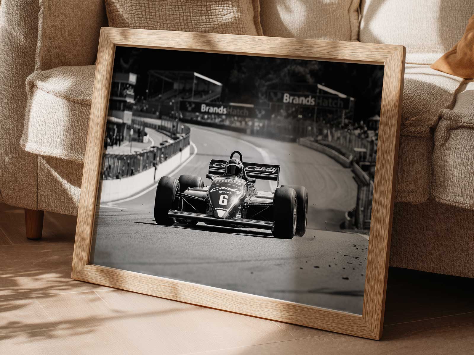 Close detail of rear tyre and sparks flying as the Tyrrell scrapes the track, highlighting friction, texture, and intensity